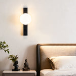 Balanced Globe Wall Sconce in Black Travertine and Opal Glass