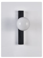 Balanced Globe Wall Sconce in Black Travertine and Opal Glass