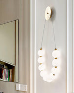 bead-cascade-loop-wall-lamp