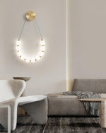 bead-cascade-loop-wall-lamp