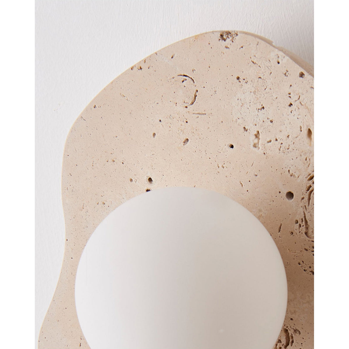blob-travertine-wall-lamp