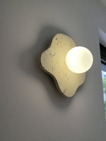 blob-travertine-wall-lamp