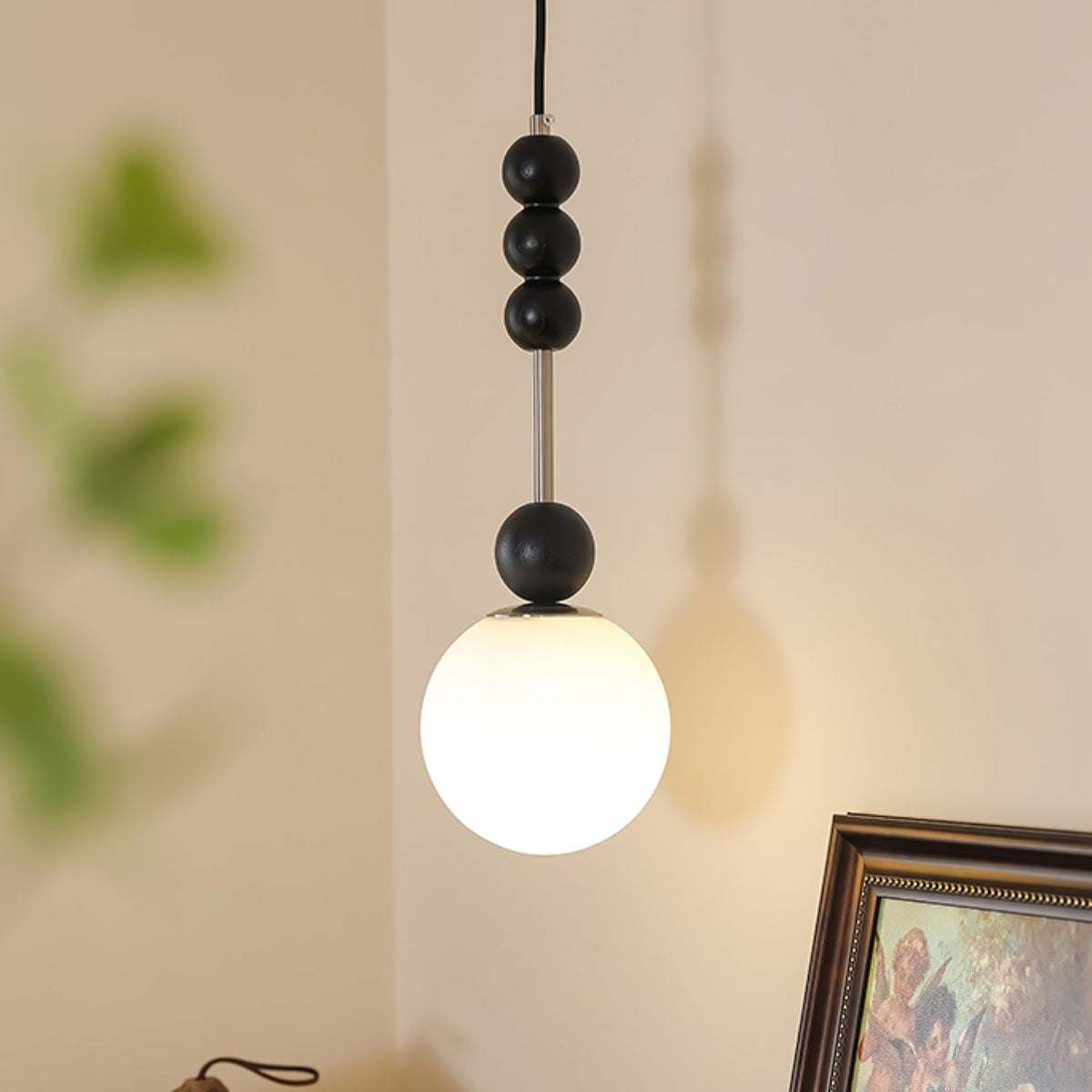 Bola Modern Pendant Light with Opal Glass Globe and Black Spheres