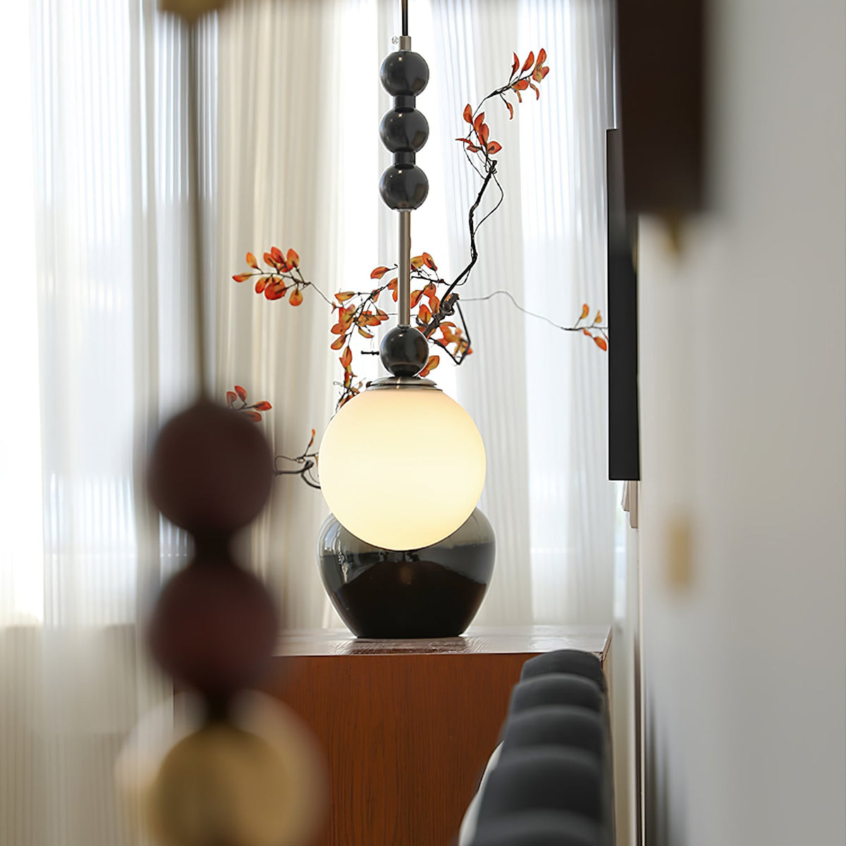 Bola Modern Pendant Light with Opal Glass Globe and Black Spheres