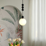 Bola Modern Pendant Light with Opal Glass Globe and Black Spheres