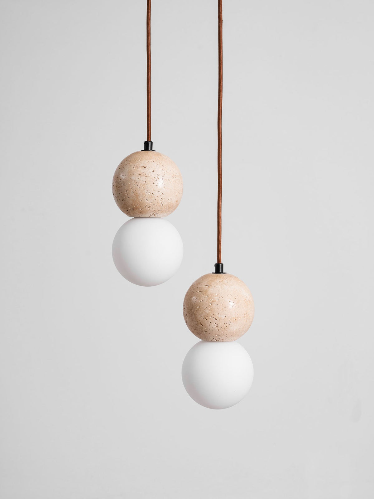 Camille Travertine Pendant Light – Natural Stone Sphere with Opal Glass Globe