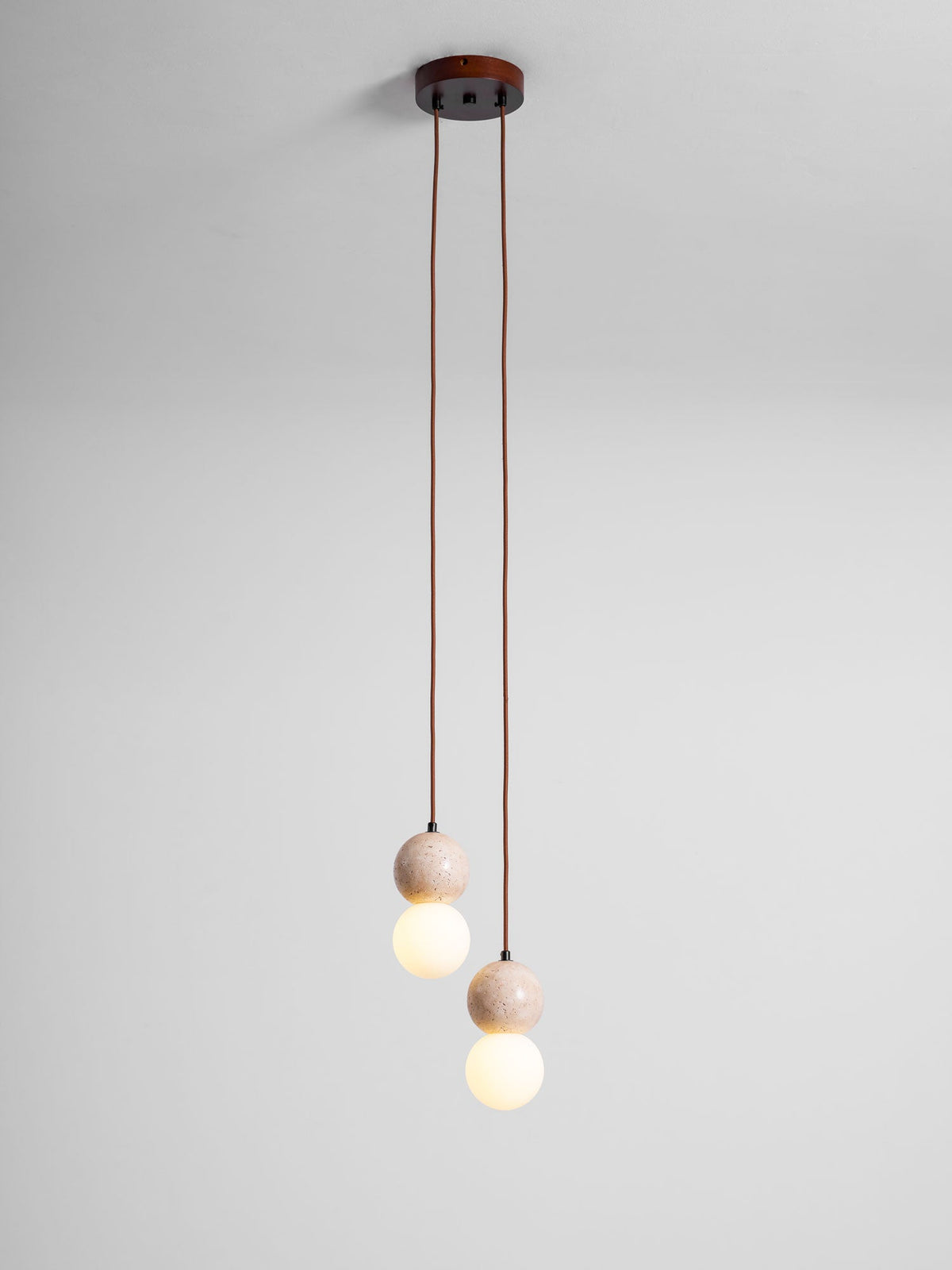 Camille Travertine Pendant Light – Natural Stone Sphere with Opal Glass Globe
