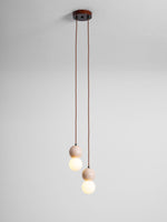 Camille Travertine Pendant Light – Natural Stone Sphere with Opal Glass Globe