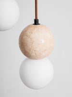 Camille Travertine Pendant Light – Natural Stone Sphere with Opal Glass Globe