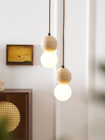 Camille Travertine Pendant Light – Natural Stone Sphere with Opal Glass Globe