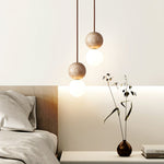 Camille Travertine Pendant Light – Natural Stone Sphere with Opal Glass Globe