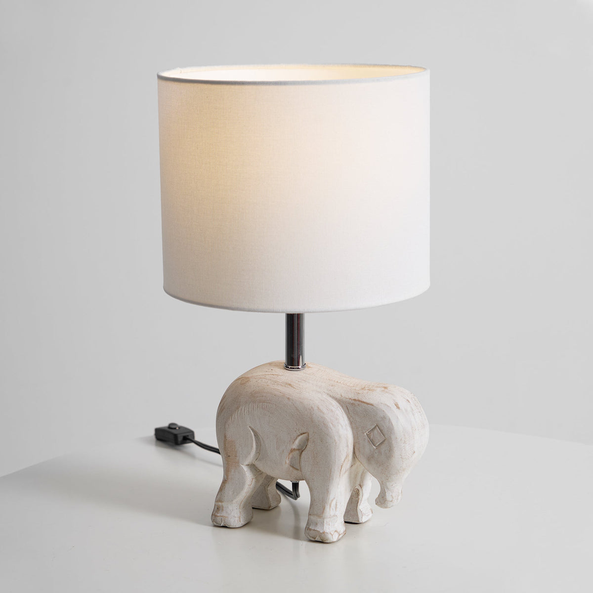 carved-wood-animal-table-lamp