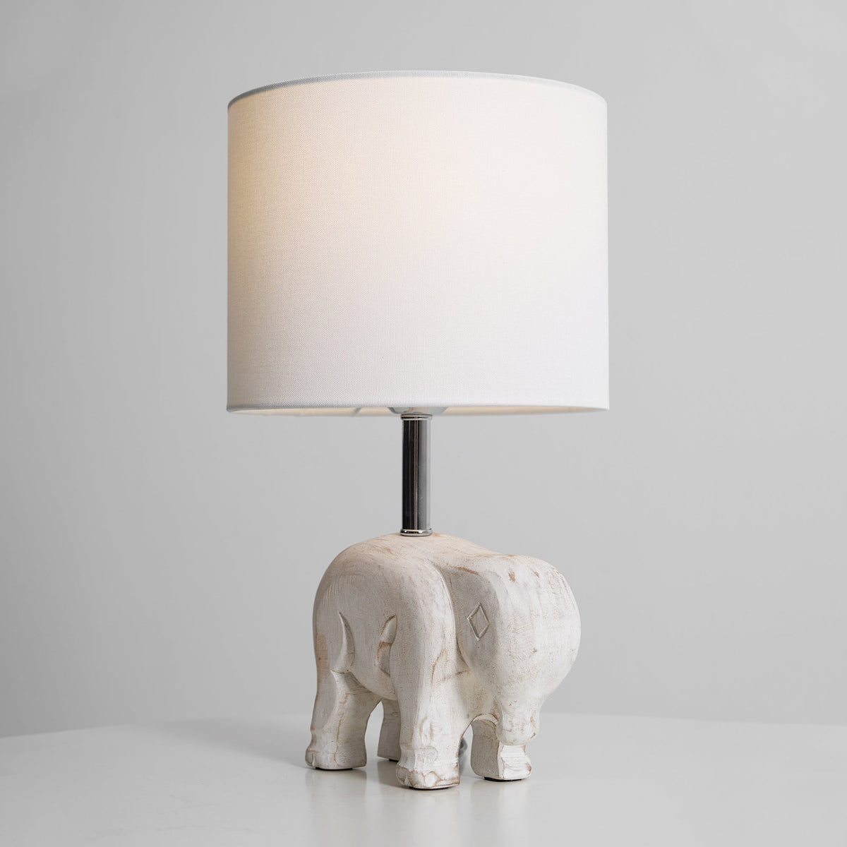 carved-wood-animal-table-lamp