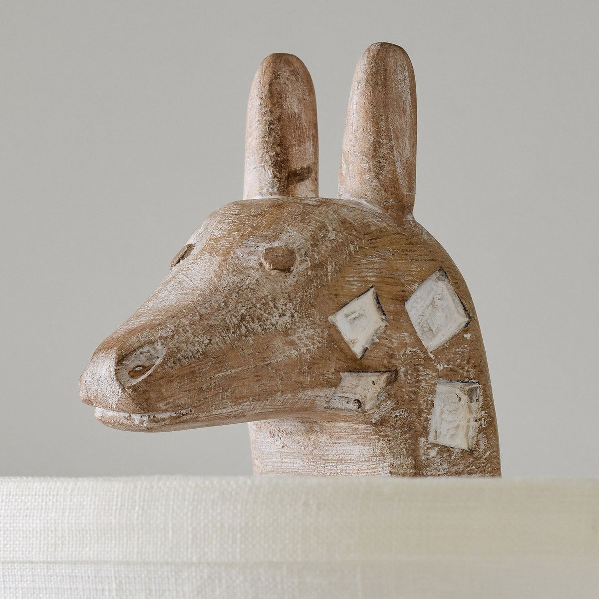 carved-wood-animal-table-lamp