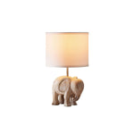 carved-wood-animal-table-lamp