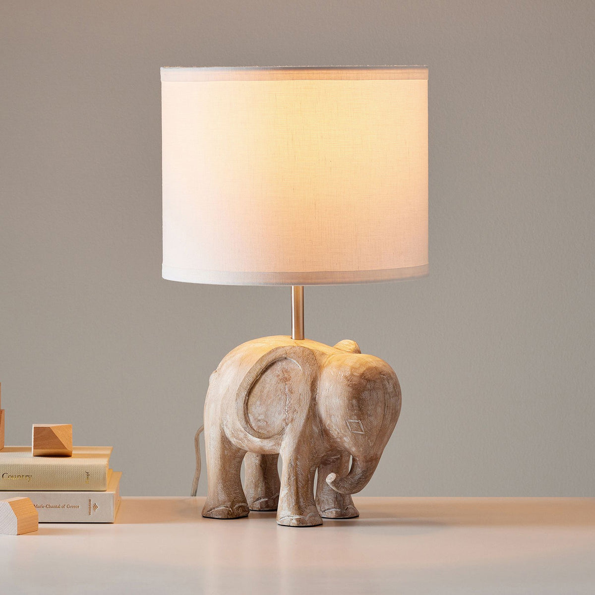 carved-wood-animal-table-lamp