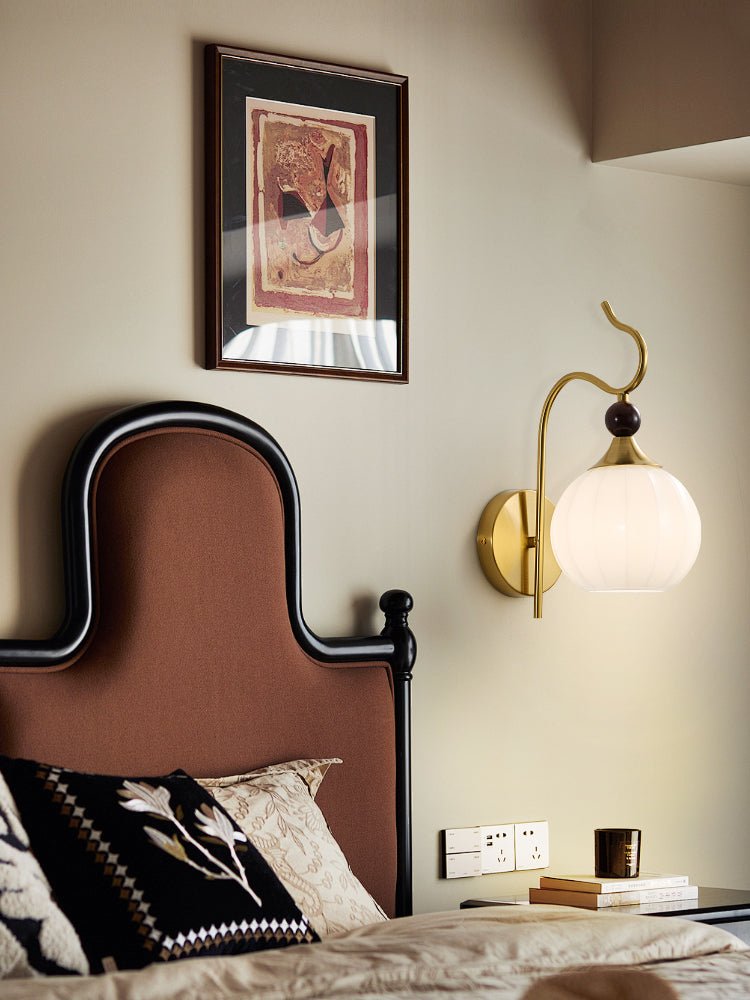 Celeste Curved Wall Sconce in Gold or Black with Pleated Glass Shade