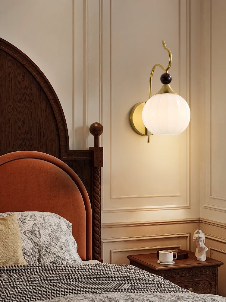 Celeste Curved Wall Sconce in Gold or Black with Pleated Glass Shade