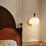 Celeste Curved Wall Sconce in Gold or Black with Pleated Glass Shade