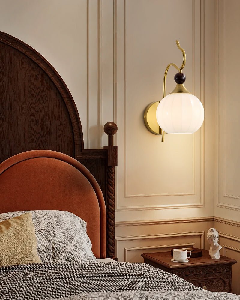 Celeste Curved Wall Sconce in Gold or Black with Pleated Glass Shade