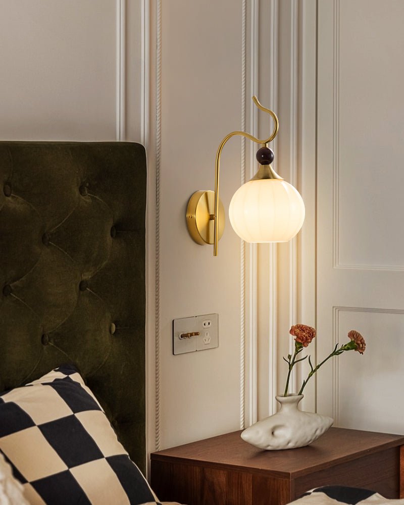 Celeste Curved Wall Sconce in Gold or Black with Pleated Glass Shade