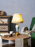 Chaslyn Desk Lamp – Blue Ceramic & Brass Table Lamp with Beige Fabric Shade