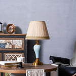 Chaslyn Desk Lamp – Blue Ceramic & Brass Table Lamp with Beige Fabric Shade