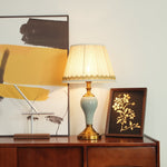 Chaslyn Desk Lamp – Blue Ceramic & Brass Table Lamp with Beige Fabric Shade