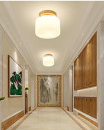 Clinio Flush Mount Ceiling Light in Brass and Opal Glass
