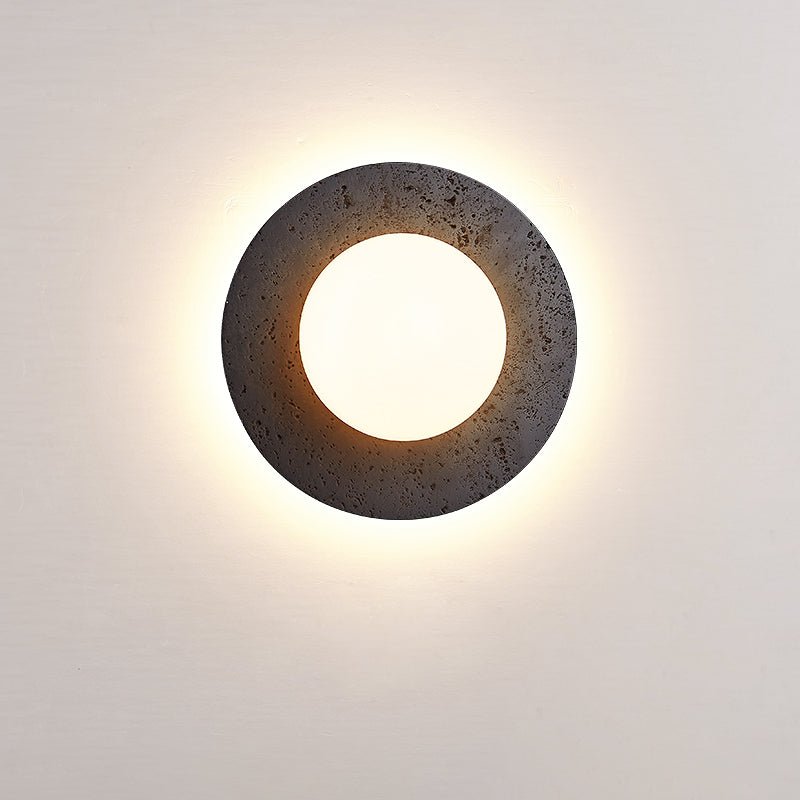 Crater Backlit Wall Sconce in Black Travertine with Opal Glass Globe