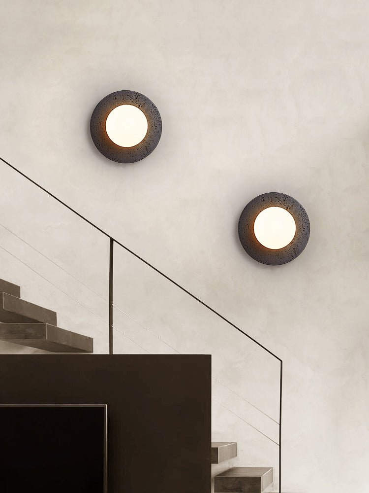 Crater Backlit Wall Sconce in Black Travertine with Opal Glass Globe