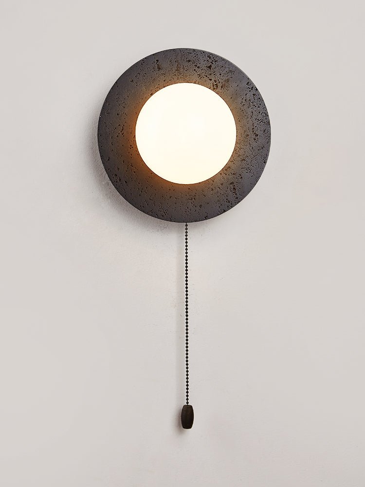 Crater Backlit Wall Sconce in Black Travertine with Opal Glass Globe