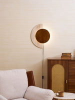 Crescent Halo Plug-In Wall Sconce in Natural Travertine and Wood