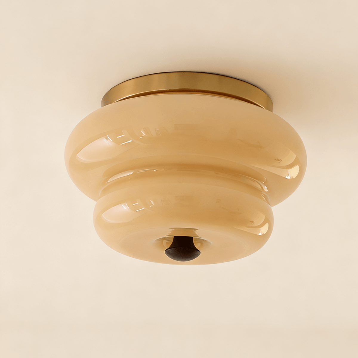 Curvaceous Flush Mount Ceiling Light with Gold Accents and Glass Shade