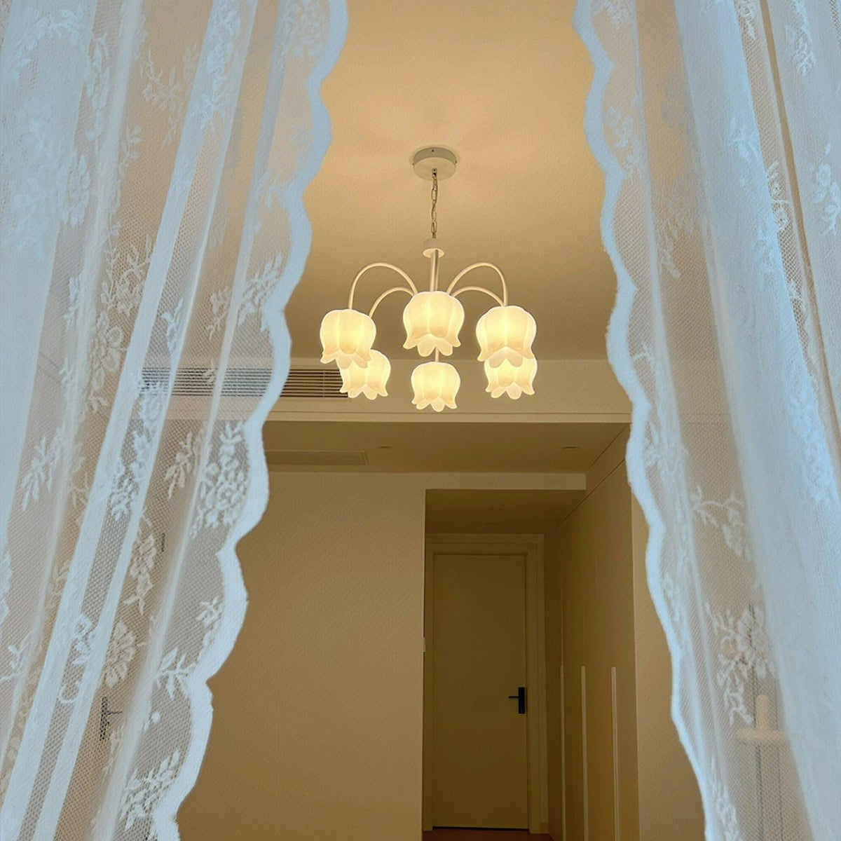 curved-arm-bell-chandelier