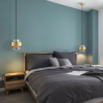 Cylinder Glass Pendant Light with Brass Accents for Modern Interiors