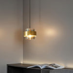 Cylinder Glass Pendant Light with Brass Accents for Modern Interiors