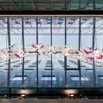 diy-flying-glass-feather-chandelier