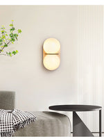 Double Globe Travertine Wall Sconce in Yellow Travertine and Glass
