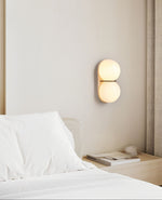 Double Globe Travertine Wall Sconce in Yellow Travertine and Glass
