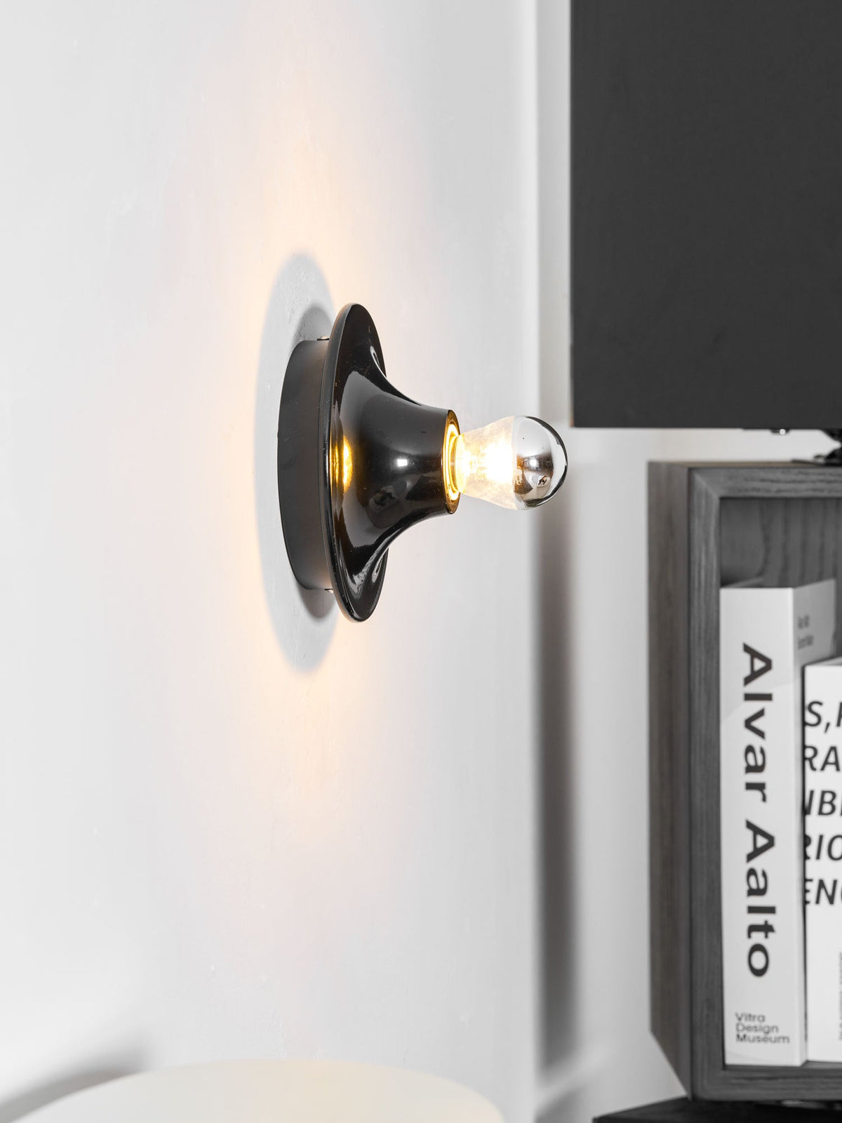 Eclipta Wall Sconce – Sculptural Metal & Glass Halo Light for Modern Interiors