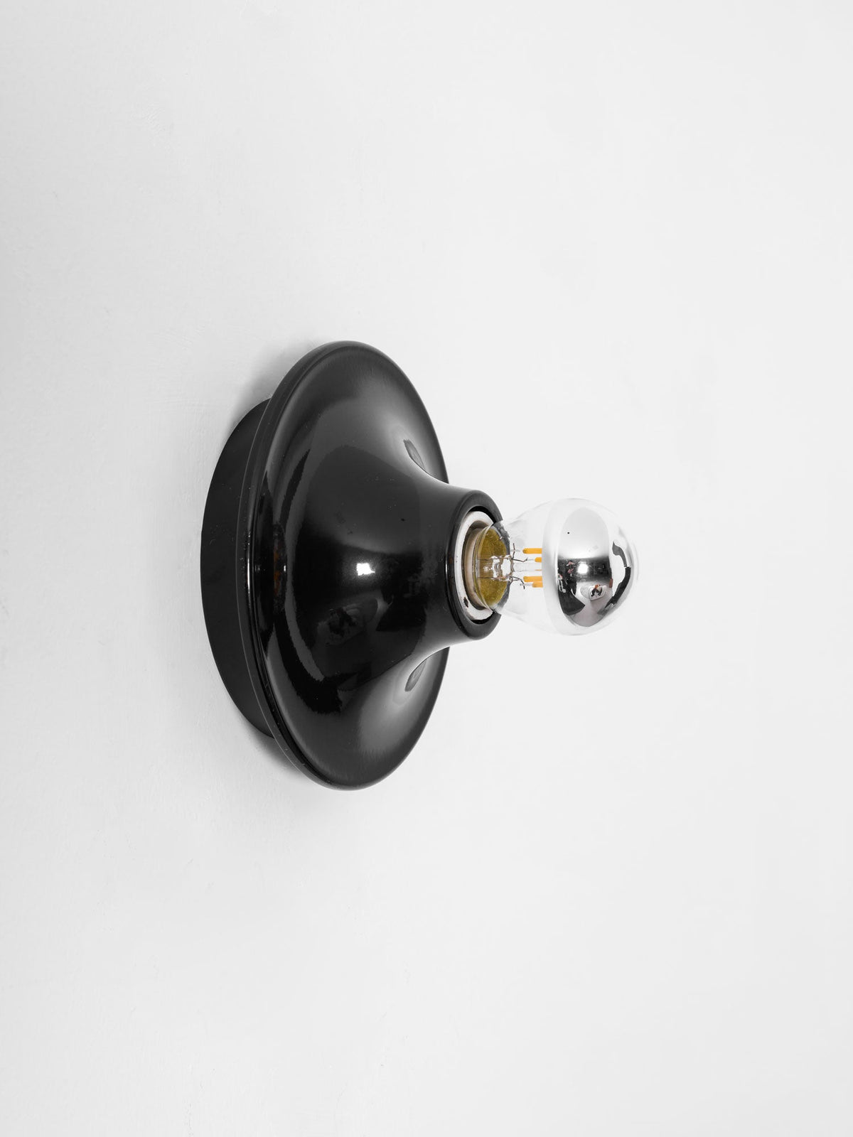 Eclipta Wall Sconce – Sculptural Metal & Glass Halo Light for Modern Interiors