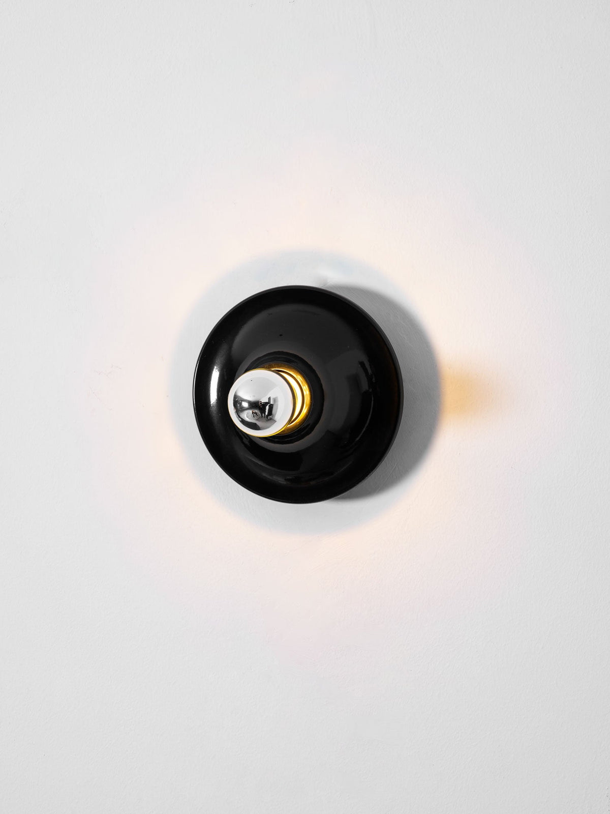 Eclipta Wall Sconce – Sculptural Metal & Glass Halo Light for Modern Interiors