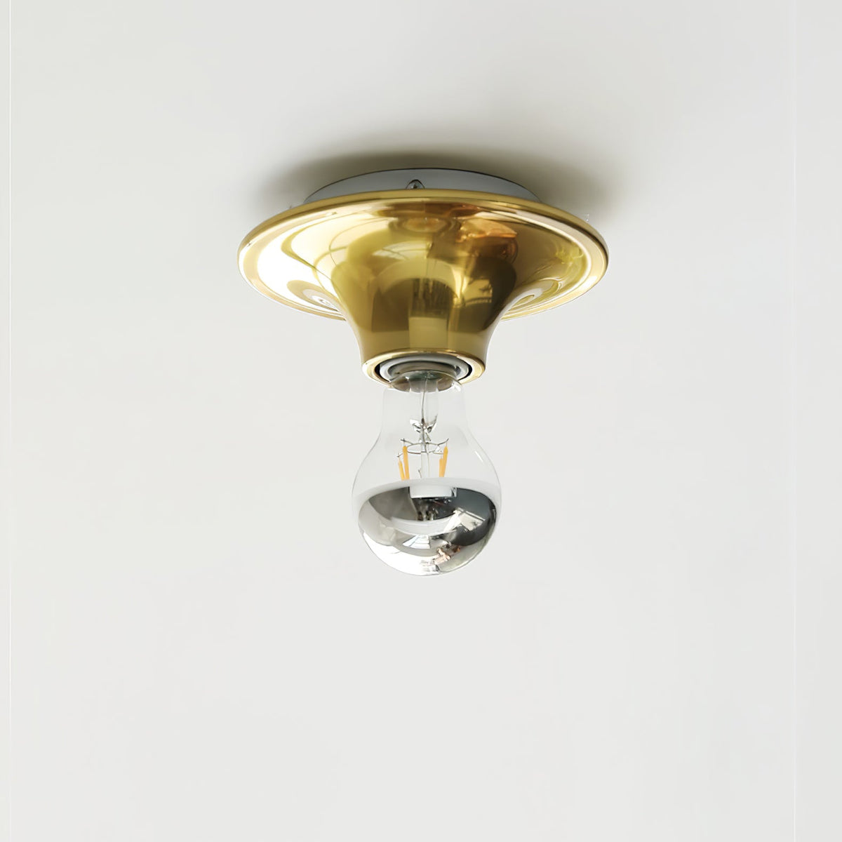 Eclipta Wall Sconce – Sculptural Metal & Glass Halo Light for Modern Interiors