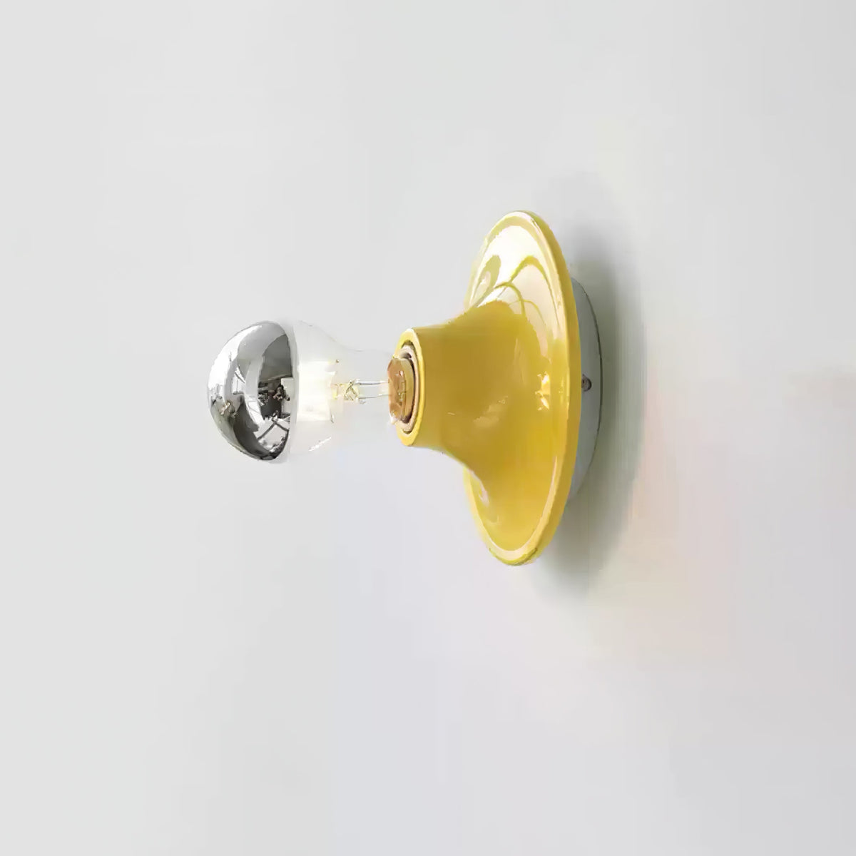 Eclipta Wall Sconce – Sculptural Metal & Glass Halo Light for Modern Interiors