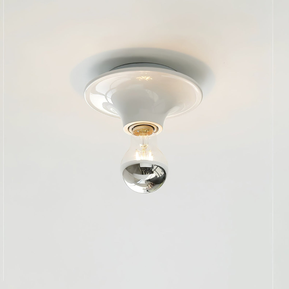 Eclipta Wall Sconce – Sculptural Metal & Glass Halo Light for Modern Interiors