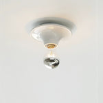 Eclipta Wall Sconce – Sculptural Metal & Glass Halo Light for Modern Interiors