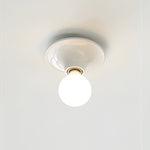 Eclipta Wall Sconce – Sculptural Metal & Glass Halo Light for Modern Interiors
