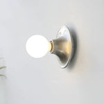 Eclipta Wall Sconce – Sculptural Metal & Glass Halo Light for Modern Interiors