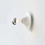 Eclipta Wall Sconce – Sculptural Metal & Glass Halo Light for Modern Interiors